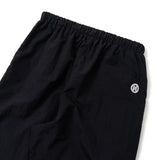 N logo side-zip nylon pants