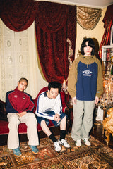 9090 × UMBRO RAGLAN ANORAK