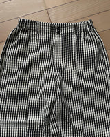 Front tuck loose check pants