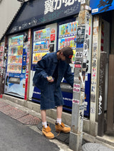 Switched denim shorts