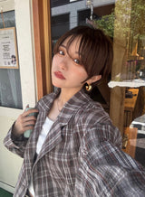 チェック柄のテーラードジャケット