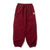 N logo side-zip nylon pants