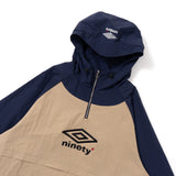 9090 × UMBRO RAGLAN ANORAK