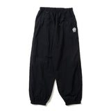 N logo side-zip nylon pants