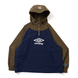 9090 × UMBRO RAGLAN ANORAK