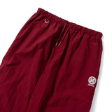 N logo side-zip nylon pants