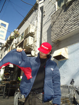 9090 × umbro Removable Hood Puffer Jacket