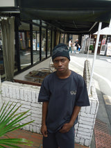 9090 × pH-1 90 Logo Tee