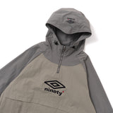 9090 × UMBRO RAGLAN ANORAK