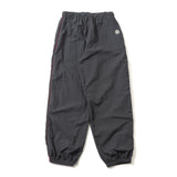 N logo side-zip nylon pants