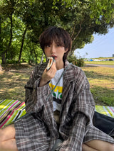 チェック柄のテーラードジャケット