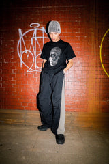 DEFORMATION LINE NYLON PANTS