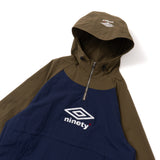 9090 × UMBRO RAGLAN ANORAK