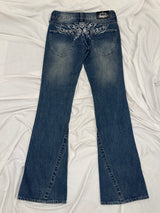 Tribal Logo Low-Rise Denim Pants