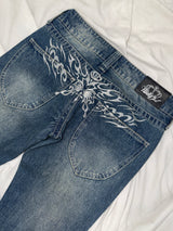 Tribal Logo Low-Rise Denim Pants