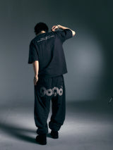 9090 × pH-1 90 Logo Tee