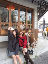 스타 로고 v 넥 손상 니트