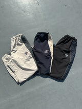 9090 × umbro Gradation Nylon Pants
