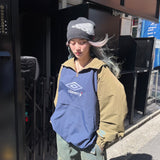 9090 × UMBRO RAGLAN ANORAK