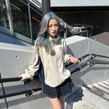 9090 × UMBRO DIAMOND LOGO TRACK JACKET