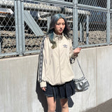 9090 × UMBRO DIAMOND LOGO TRACK JACKET