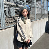 9090 × UMBRO DIAMOND LOGO TRACK JACKET