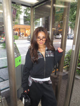 reversible check pattern zip stand