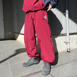 N logo side-zip nylon pants