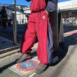 N logo side-zip nylon pants