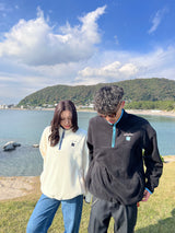 writing flower logo fleece half zip