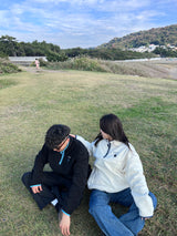 writing flower logo fleece half zip