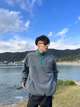 writing flower logo fleece half zip