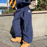 N logo side-zip nylon pants