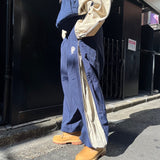 N logo side-zip nylon pants