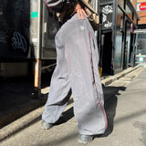 N logo side-zip nylon pants