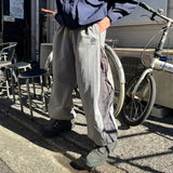 N logo side-zip nylon pants