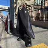 N logo side-zip nylon pants