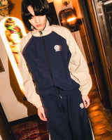 N logo side-zip nylon pants