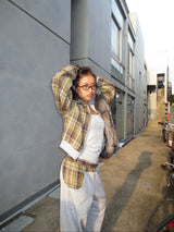 reversible check pattern zip stand