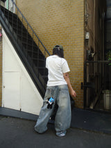 平成标志闪亮印花牛仔裤