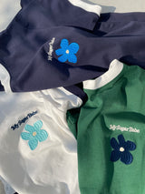 writing flower ringer logo tee