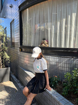 writing flower ringer logo tee