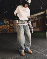 平成标志闪亮印花牛仔裤