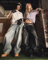 平成标志闪亮印花牛仔裤