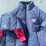 9090 × umbro Removable Hood Puffer Jacket