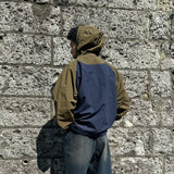 9090 × UMBRO RAGLAN ANORAK