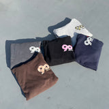 90徽標迷彩連帽衫