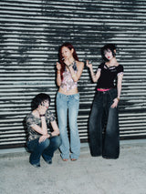 Tribal Logo Low-Rise Denim Pants
