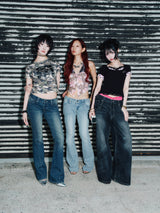 Tribal Logo Low-Rise Denim Pants