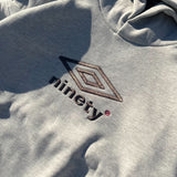 9090×Umbro協作徽標連帽衫